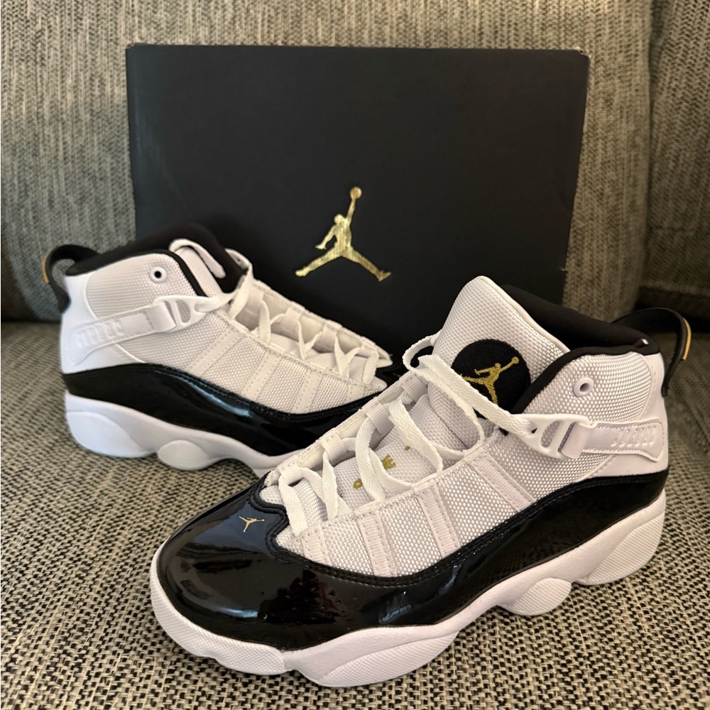 Jordan Retro High-Top Sneakers in White, Black rings